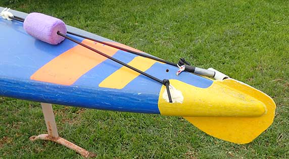 Detachable fin in place on kayak